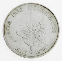 Lote 149 - PORTUGAL, MOEDA DE 1000 ESCUDOS EM PRATA 500, ANO 1998 - Moeda da República Portuguesa de 1998, 75 Anos da Liga dos Combatentes. Peso indicativo: 27 g. Dim: 40 mm (diâmetro). Nota: acondicionada em alvéolo próprio. Sem classificação atribuída p