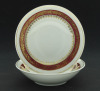 Lote 159 - SCHMIDT PORCELANA - Conjunto de 2 taças em porcelana Schmidt Brasil com faixa bordeaux e dourada com motivos vegetalistas. Dim: 14 cm (diâmetro)