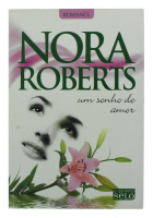 Lote 185 - UM SONHO DE AMOR, LIVRO - Por Nora Roberts. Editora O Quinto Selo. Exemplar bem estimado. 295p. Encadernação de capa de brochura