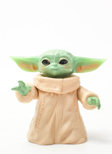 Lote 85 - YODA THE CHILD - boneco de coleção Star Wars, Teh Mandalorian the Child Yoda, movimento de cabeça e braços. Dimensão: 17 cm de altura. Bom estado. Nota: boneco em caixa com pvp de € 29, 50, consulte em https://tinyurl.com/bdhpb7kc