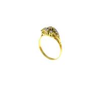 Lote 2516 - Anel de senhora em ouro amarelo 19.2K (800%), contraste Português, cravejado com 10 diamantes em talhe brilhante moderno com total de 0.60ct aprox. Peso: 2.5g e tam15, Nota: falta pequeno diamante