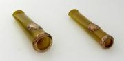 Lote 37 - Conjunto de boquilhas com aplicações em ouro de baixo teor não contrastado, com 7 cm de comprimento, em caixa de origem, sinais de uso e desgaste