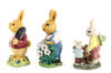 Lote 53 - FIGURAS DE COELHOS - Conjunto de 3 figuras em resina policromada representando coelhos vestidos. Dim. 17,5 cm (maior) - 3