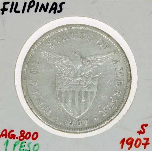 Lote 38 - FILIPINAS, MOEDA DE 1 PESO EM PRATA 800, ANO 1907 - Moeda da Administração dos Estados Unidos (1903 - 1945) de 1907. Peso indicativo: 20 g. Dim: 35 mm (diâmetro). Nota: sem classificação atribuída pela Oportunity Leilões, cabe ao licitante atrib