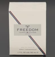 Lote 173 - TOMMY HILFIGER, FRASCO DE PERFUME - Eau de Toilette Spray "Freedom", Made in Switzerland, 50 ml. Nota: sem uso, caixa selada