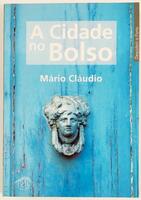 Lote 51 - 1ª EDIÇÃO: A CIDADE NO BOLSO - Mário Cláudio; fotografias de Rui Luís Romão, Porto, Campo das Letras, 2000. 1ª edição. Encadernação editorial em brochura. Excelente exemplar. Miolo limpo. Obra muito apreciada e procurada