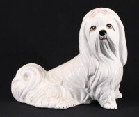 Lote 62 - BICHON MALTÊS - Escultura em cerâmica monocroma branca com detalhes policromados. Dim: 24x29x16 cm