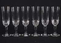 Lote 66 - FLUTES DE CHAMPAGNE EM VIDRO - Conjunto de 6 flutes de pé em vidro translucido. Dim: 19,5 cm