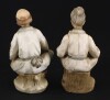 Lote 238 - FIGURAS CHINESAS EM BISCUIT - 2 esculturas em biscuit policromado representando figuras chinesas sentadas. Dim: 13,5 cm - 4