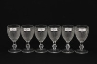 Lote 203 - VISTA ALEGRE, CÁLICES DE LICOR - 6 cálices de pé em vidro com decoração "Ponta de Diamante". Dim: 10 cm. Nota: marcados em etiquetas e nas bases. Em caixa original