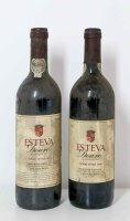 Lote 103 - ESTEVA, TINTO 1985 e 1990 - Duas Garrafas sendo 1 de Vinho Tinto, Esteva, Douro-DOC, Colheita 1985, Casa Ferreirinha (750ml-12%vol); e outra Garrafa de Vinho Tinto, Esteva, Douro-DOC, Colheita 1990, Casa Ferreirinha (750ml-11,5%vol). Sinais d