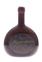 Lote 252 - AGUARDENTE DUMONT 1964 - Garrafa de Aguardente de Vinho, 1964, São Miguel, Açores, (750ml aprox.)