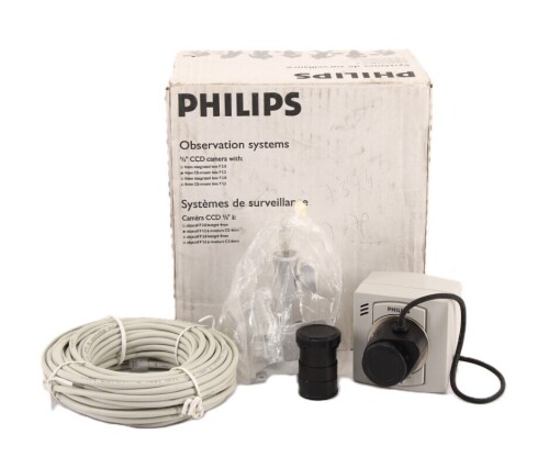 Lote 54 - PHILIPS, CÂMARA DE VIDEO VIGILÂNCIA - Modelo VCM 7177/00T com lente 4mm Cs Mount f 1.2. Dim: 7x7x9 cm. Nota: em caixa original com suporte de montagem, cabo e lente adicional