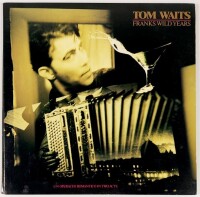 Lote 61 - TOM WAITS DISCO DE VINIL FRANKS WILD TEARS - LP editado em 1987 pela Polygram para a Island Records, com o código ITW3. Capa com pequenos sinais de uso, disco novo e nunca tocado