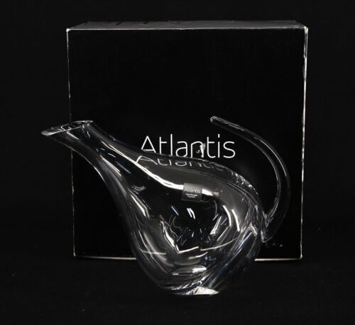 Lote 30 - ATLANTIS, DECANTER - Modelo spirit em cristal. Dim: 20x27x15 cm. Decanter idêntico à venda por € 235. Nota: em caixa de cartão original. Consultar valor indicativo em https://www.pollux.pt/pt/decanter-spirit-7714-liso-atlantis.html