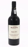 Lote 157 - MADEIRA BLANDY'S BUAL 1977 - Garrafa de Vinho da Madeira, Bual 1977, Bottled in 2009, Madeira Wine Company, Funchal, Madeira, (750ml - 20%vol.). Nota: garrafa idêntica à venda por € 249. Consultar valor indicativo em https://winehouseportugal.c