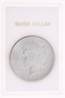 Lote 4 - ESTADOS UNIDOS DA AMÉRICA, MOEDA DE 1 DOLLAR EM PRATA 900, ANO 1921 - Moeda dos Estados Unidos da América, Peace Silver Dollar de 1921. Peso indicativo: 26.73 g. Dim: 38.1 mm (diâmetro). Moeda idêntica à venda por € 211 (USD 229). Nota: apresent