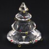 Lote 12 - SWAROVSKI, ÁRVORE DE NATAL - Em cristal lapidado decorada com cristais coloridos. Dim: 7 cm. Nota: com um pvp original de € 122