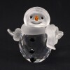 Lote 18 - SWAROVSKI, BONECO DE NEVE - Em cristal lapidado em cristal baço e translucido e cristais coloridos. Dim: 5 cm. Nota: com um pvp original de € 199