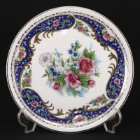 Lote 195 - T. LIMOGES, PRATO EM PORCELANA - Decoração floral policromada com ornamentos dourados, marcado na base. Dim: 26 cm