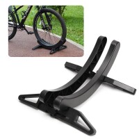 Lote 125 - Suporte para bicicletas de chão ajustável Wiogence, design espessado para todos os pneus de bicicleta com 26-80 mm de largura. Adequado para a arrumação no interior de bicicletas de estrada e BTT. Acabamento em preto. O artigo provém de uma enc