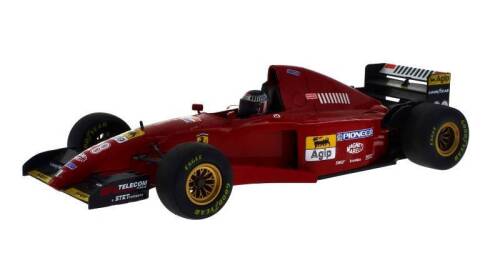 Lote 67 - Miniatura automóvel Ferrari 412 T2, do fabricante Onyx. Dim: 24 cm. Notas: 1 espelho retrosivor partido e colado.