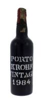 Lote 1260 - Garrafa de Vinho do Porto, Krohn´s, Vintage Colheita 1984, Wiese & Krohn, (750ml-20,5%vol). Nota: À venda em site da especialidade €67,50 - http://www.garrafeiranacional.com/1984-krohn-vintage-porto.html , Lacre ligeiramente danificado e ligei